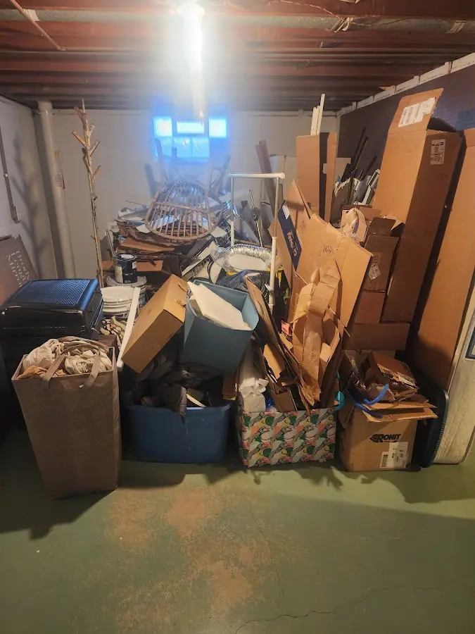 Roll-off dumpster container at job site for 6 Yard Dumpster Rental in Windber