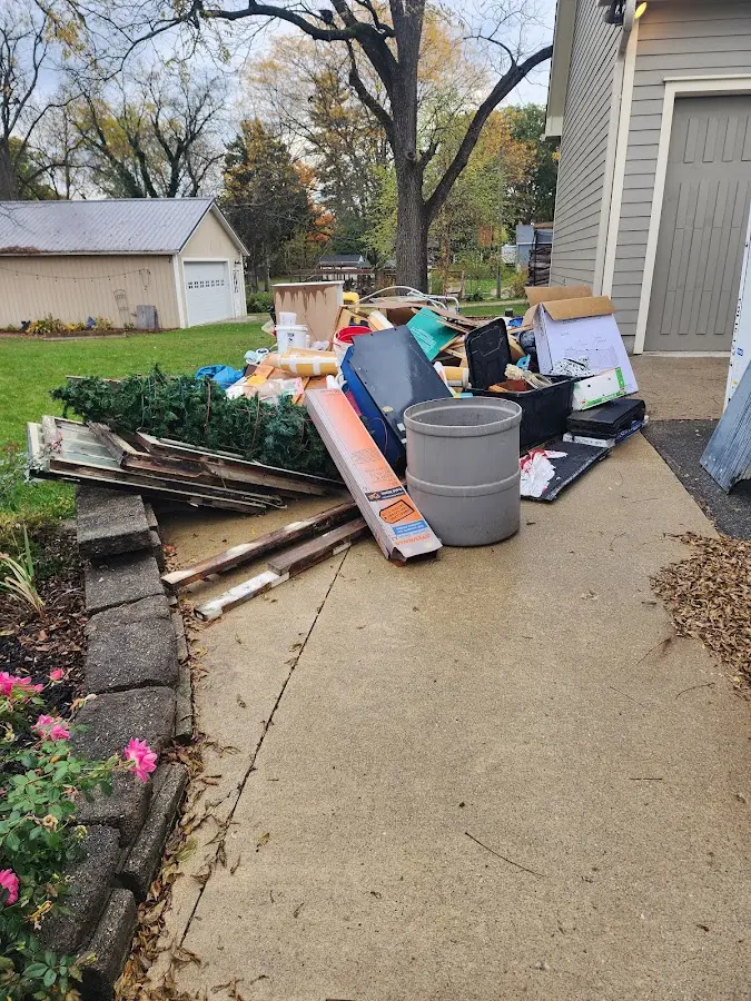 Dumpster being loaded with debris for 3 Yard Dumpster Rental in Windber